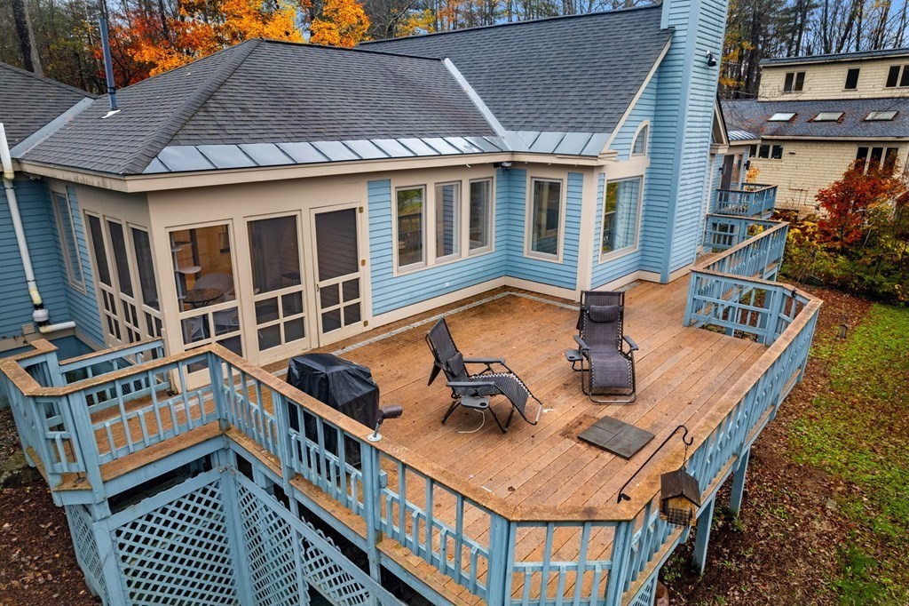 7 Par Brae Grantham, NH 03753 - Photo 36 of 42 a view of a house with pool and chairs
