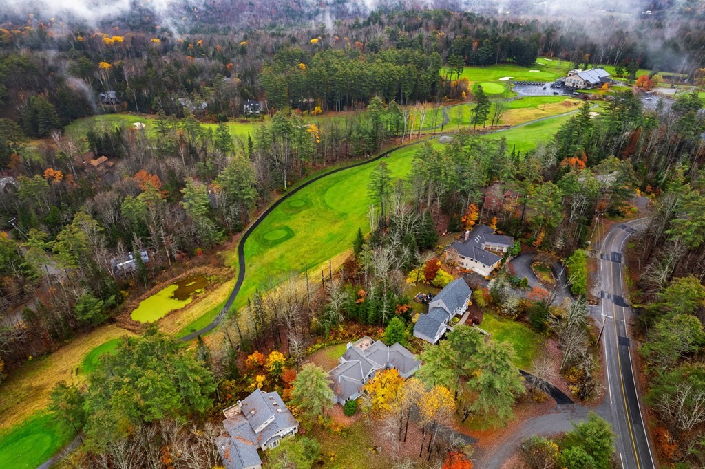 7 Par Brae Grantham, NH 03753 - Photo 40 of 42 a view of a lake with a yard