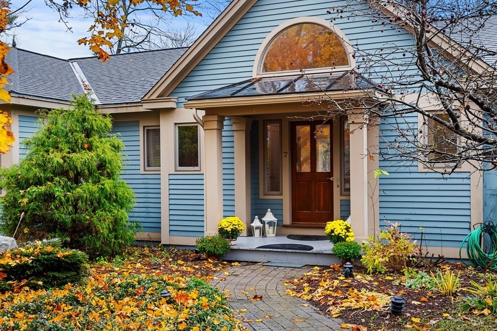 7 Par Brae Grantham, NH 03753 - Photo 4 of 42 a view of brick house with potted plants and a large tree