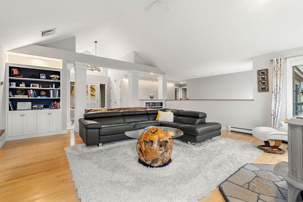 7 Par Brae Grantham, NH 03753 - Photo 6 of 42 a living room with furniture gym equipment and view of kitchen