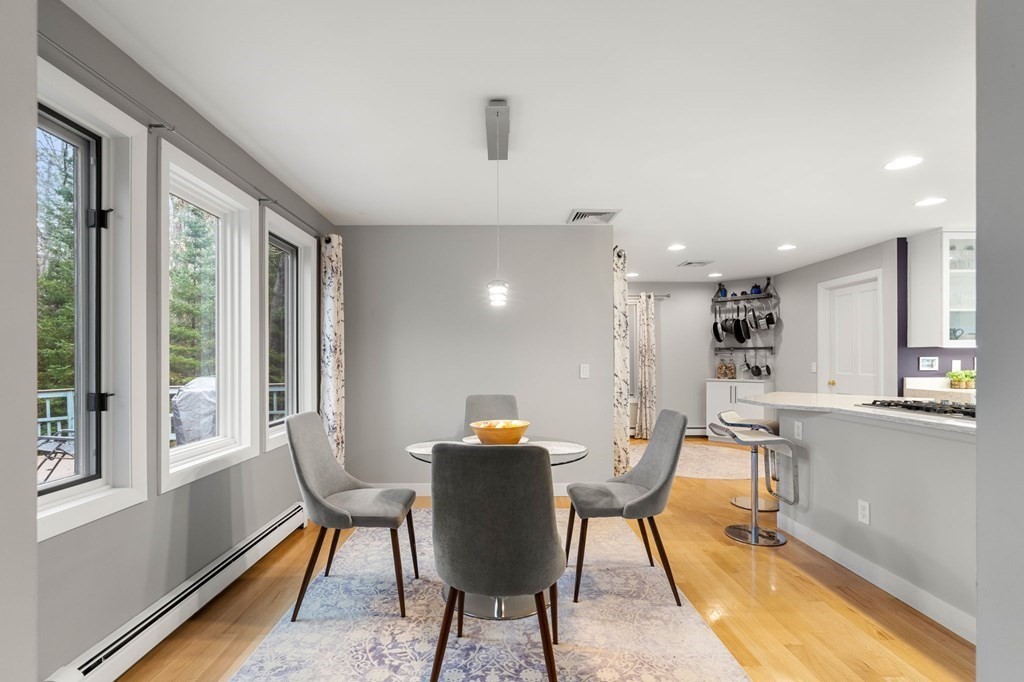 7 Par Brae Grantham, NH 03753 - Photo 7 of 42 a view of a dining room with furniture and a window