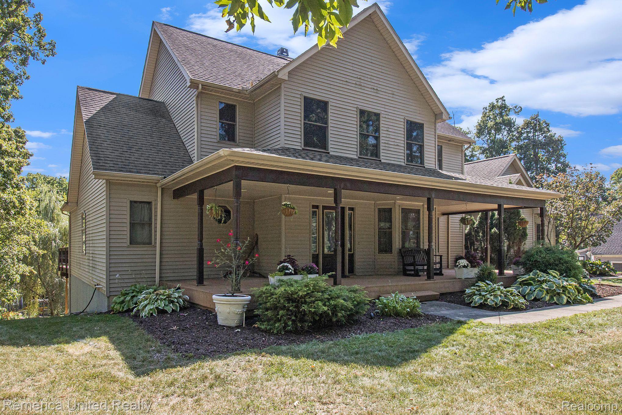 3470 East Highland Road Howell, MI 48843 - Photo 15 of 66 Wrap Around Front Deck