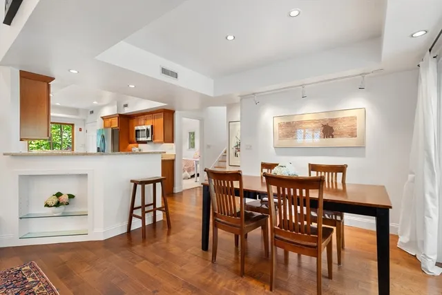 a view of dining room and hall with furniture