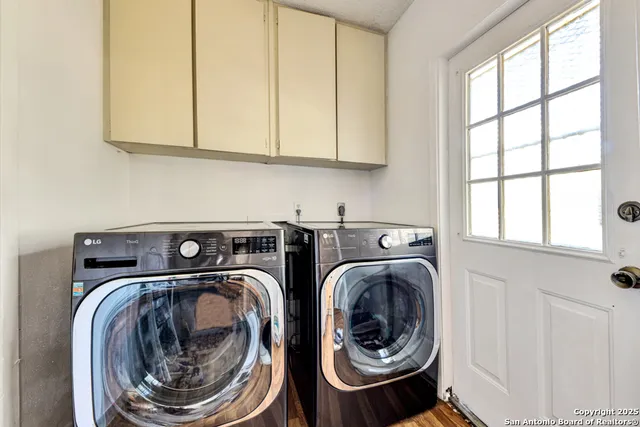 a utility room with dryer and washer