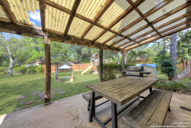 a patio with an outdoor seating