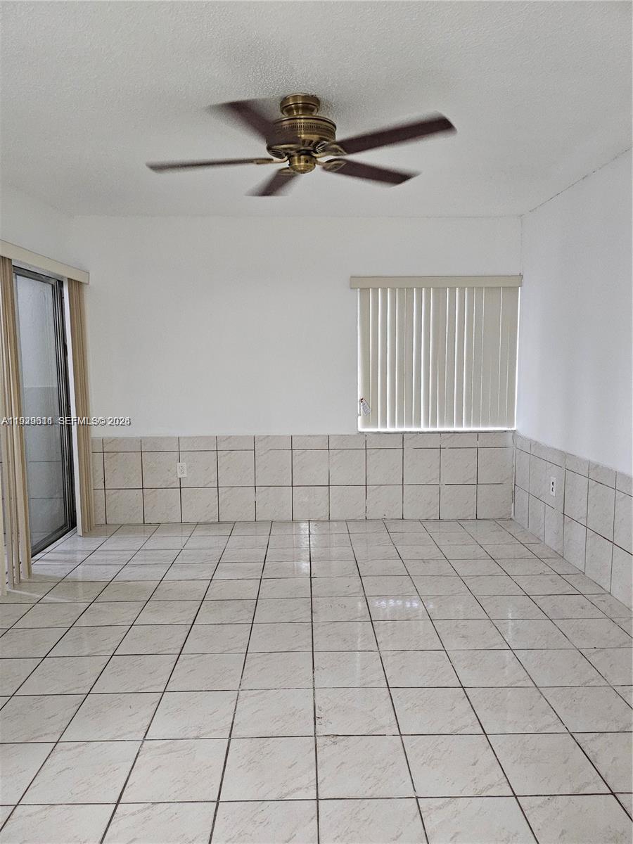 10641 Southwest 108th Avenue, Unit 1H Miami, FL 33176 - Photo 12 of 23 a view of an empty room