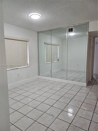 a bathroom with a sink and a shower