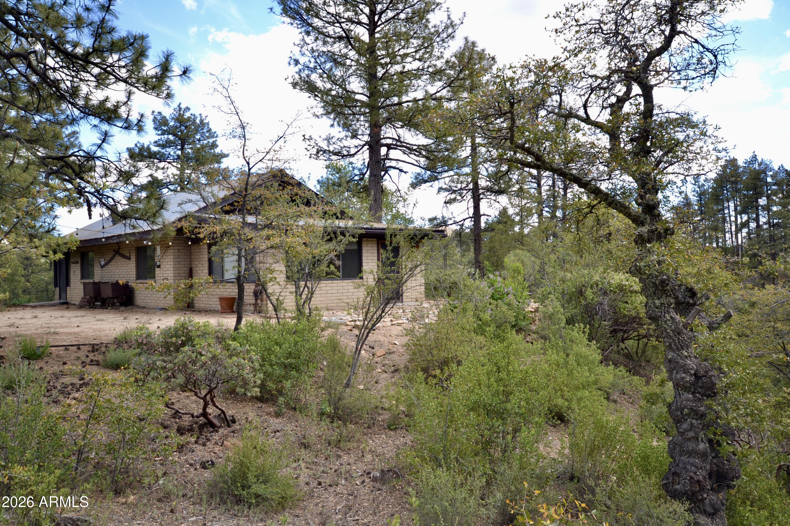 23617 South Demascus Road Crown King, AZ 86343 - Photo 49 of 50 a view of a house with a yard