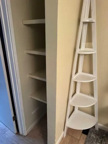 a bathroom with a sink and mirror