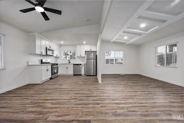 a view of kitchen and windows