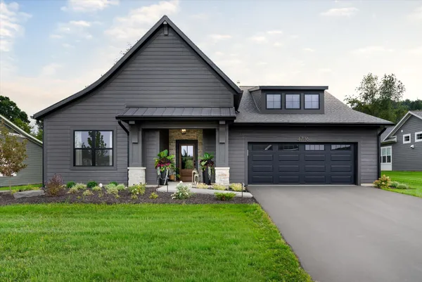 $1,050,000 | 4704 Knapp Blf Drive, Ada, MI 49301