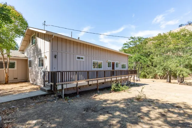 a kitchen with a stove and a sink