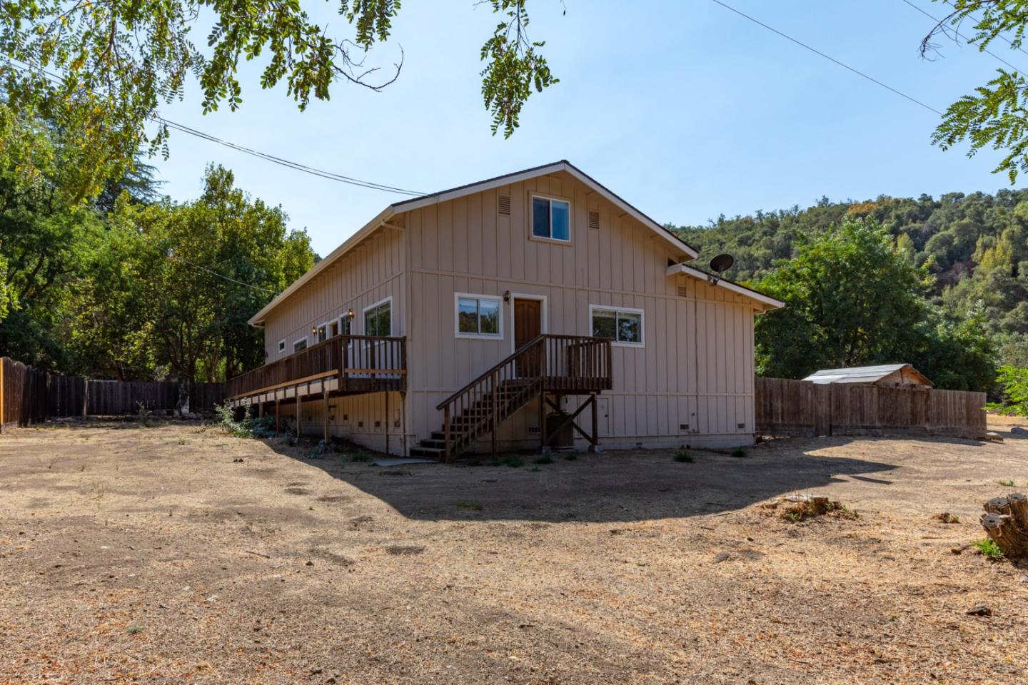 20500 Cachagua Road Carmel Valley, CA 93924 - Photo 16 of 66 a view of a house with a yard