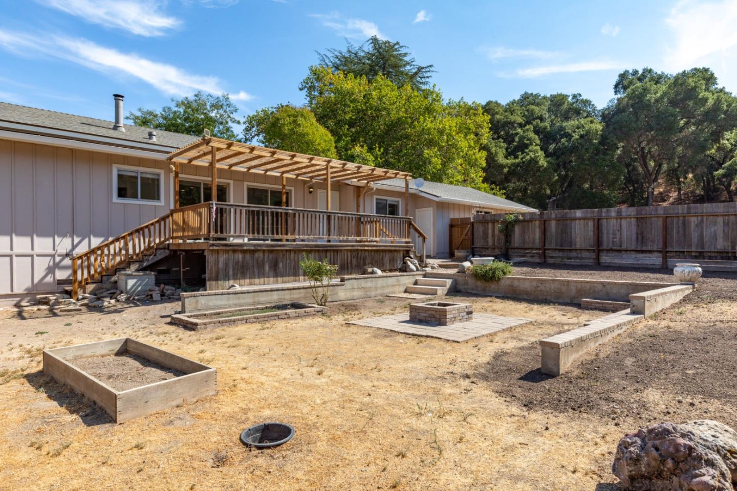 20500 Cachagua Road Carmel Valley, CA 93924 - Photo 19 of 66 a view of a house with pool and chairs