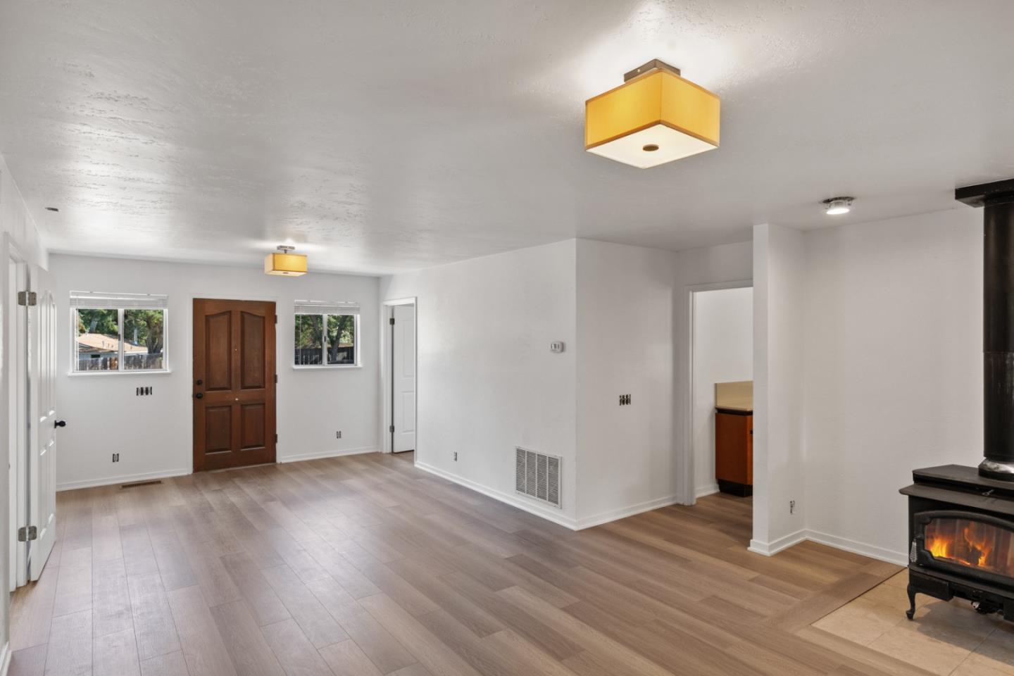20500 Cachagua Road Carmel Valley, CA 93924 - Photo 27 of 66 a view of a livingroom with wooden floor and a cabinet
