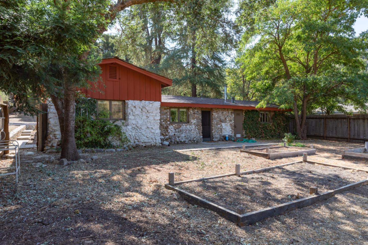 20500 Cachagua Road Carmel Valley, CA 93924 - Photo 34 of 65 a view of a house with backyard and tree