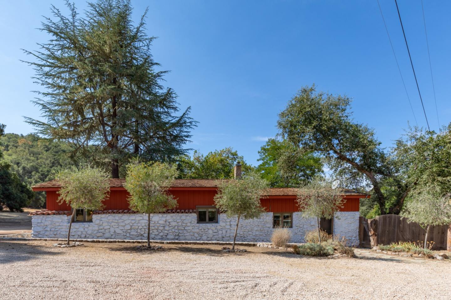 20500 Cachagua Road Carmel Valley, CA 93924 - Photo 34 of 66 a front view of a house with a yard