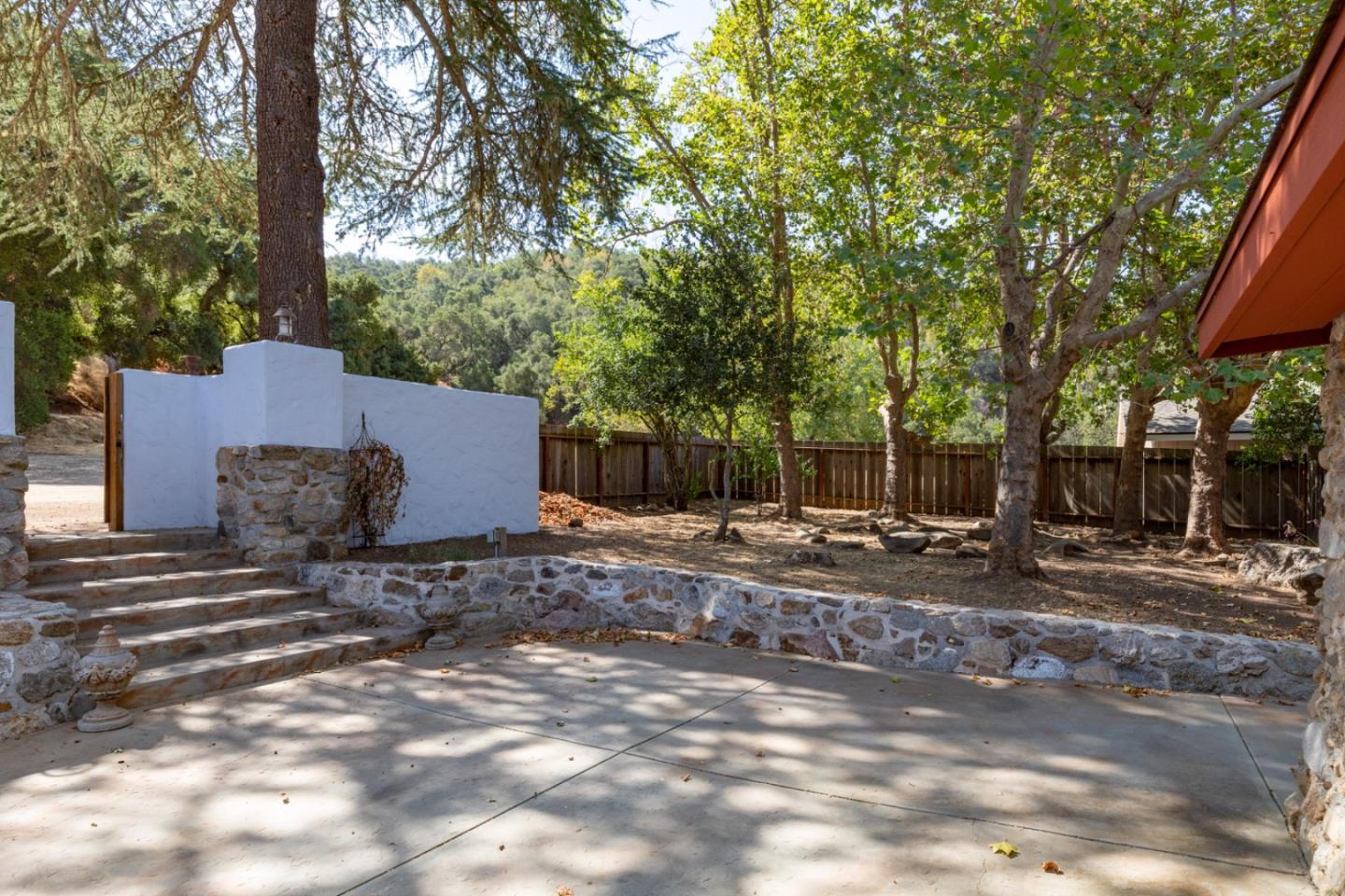 20500 Cachagua Road Carmel Valley, CA 93924 - Photo 39 of 65 a view of a house with a yard and tree s