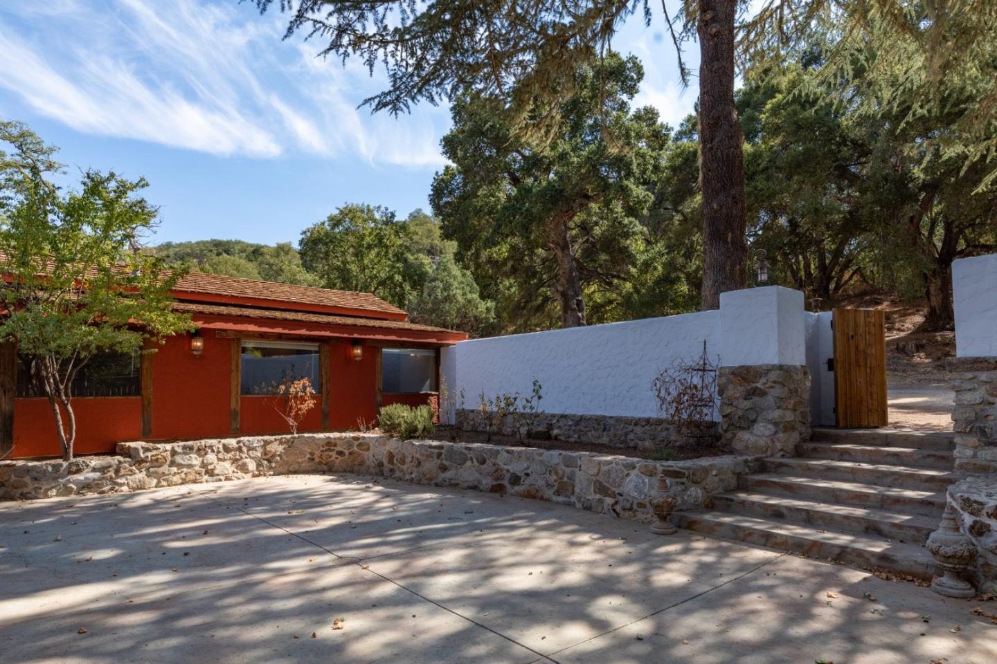 20500 Cachagua Road Carmel Valley, CA 93924 - Photo 43 of 66 a front view of a house with a yard