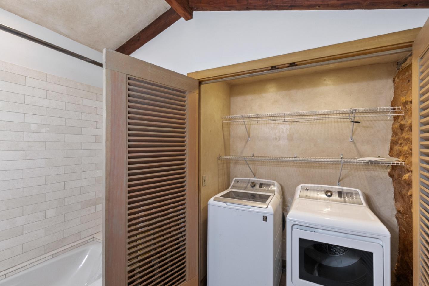 20500 Cachagua Road Carmel Valley, CA 93924 - Photo 53 of 66 a utility room with dryer and washer