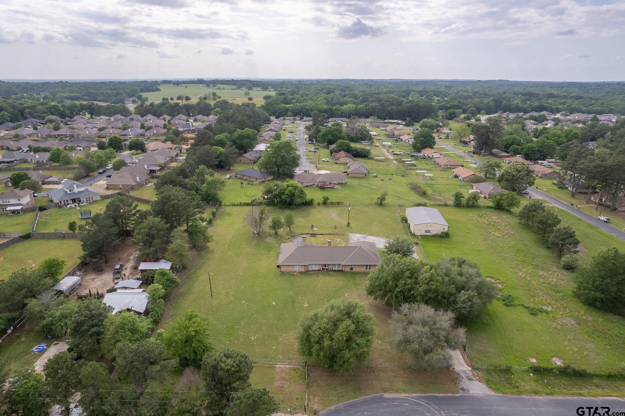 2201 Ridgley Tyler, TX 75703 - Photo 39 of 42 an aerial view of lake residential house with outdoor space