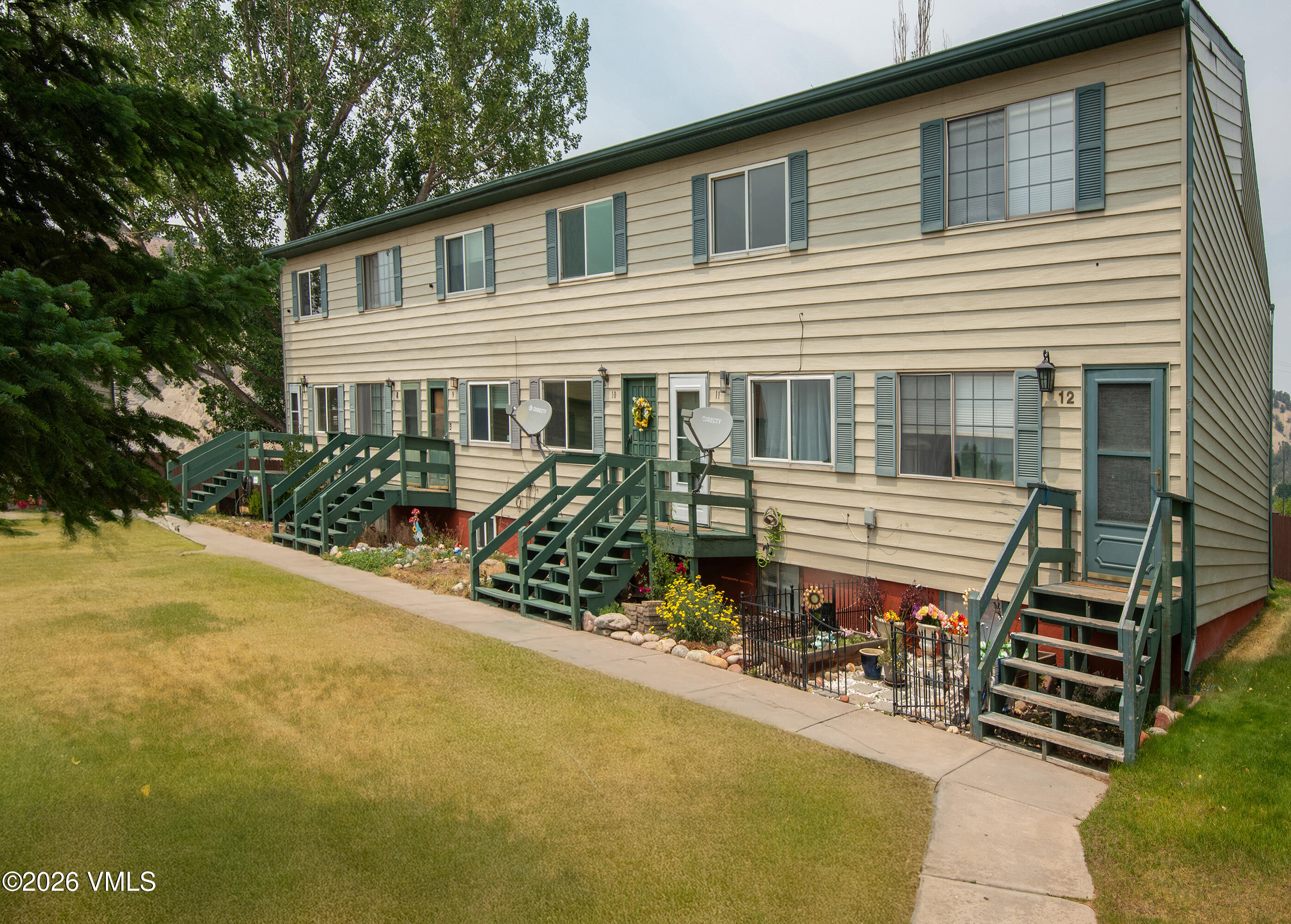 85 Chambers Avenue, Unit 10 Eagle, CO 81631 - Photo 40 of 41 a front view of a house with garden