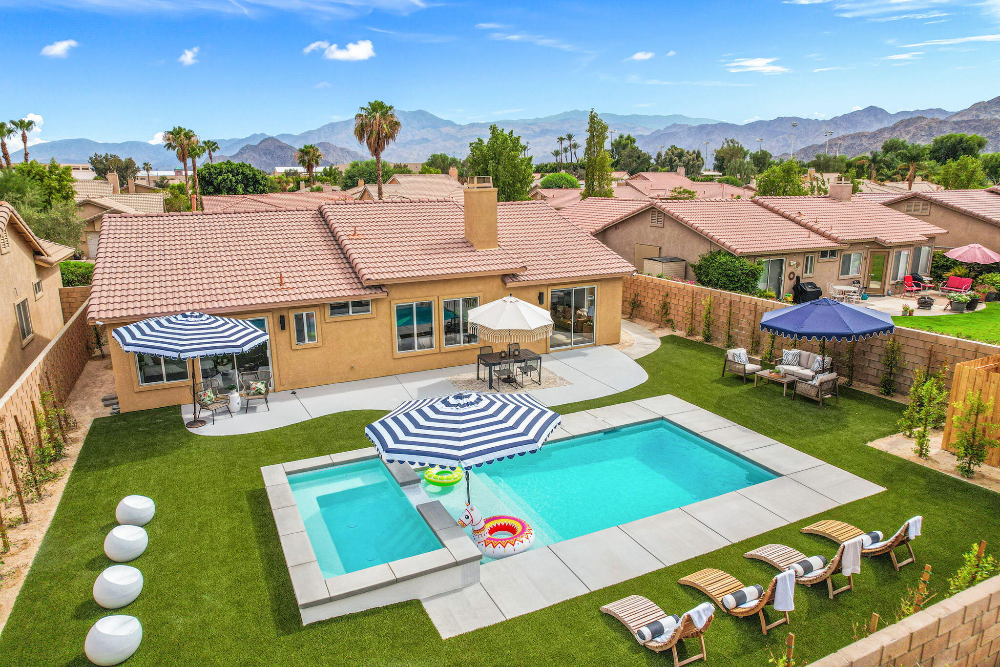 79340 Paseo Del Rey La Quinta, CA 92253 - Photo 14 of 69 an aerial view of an chairs and tables in the patio