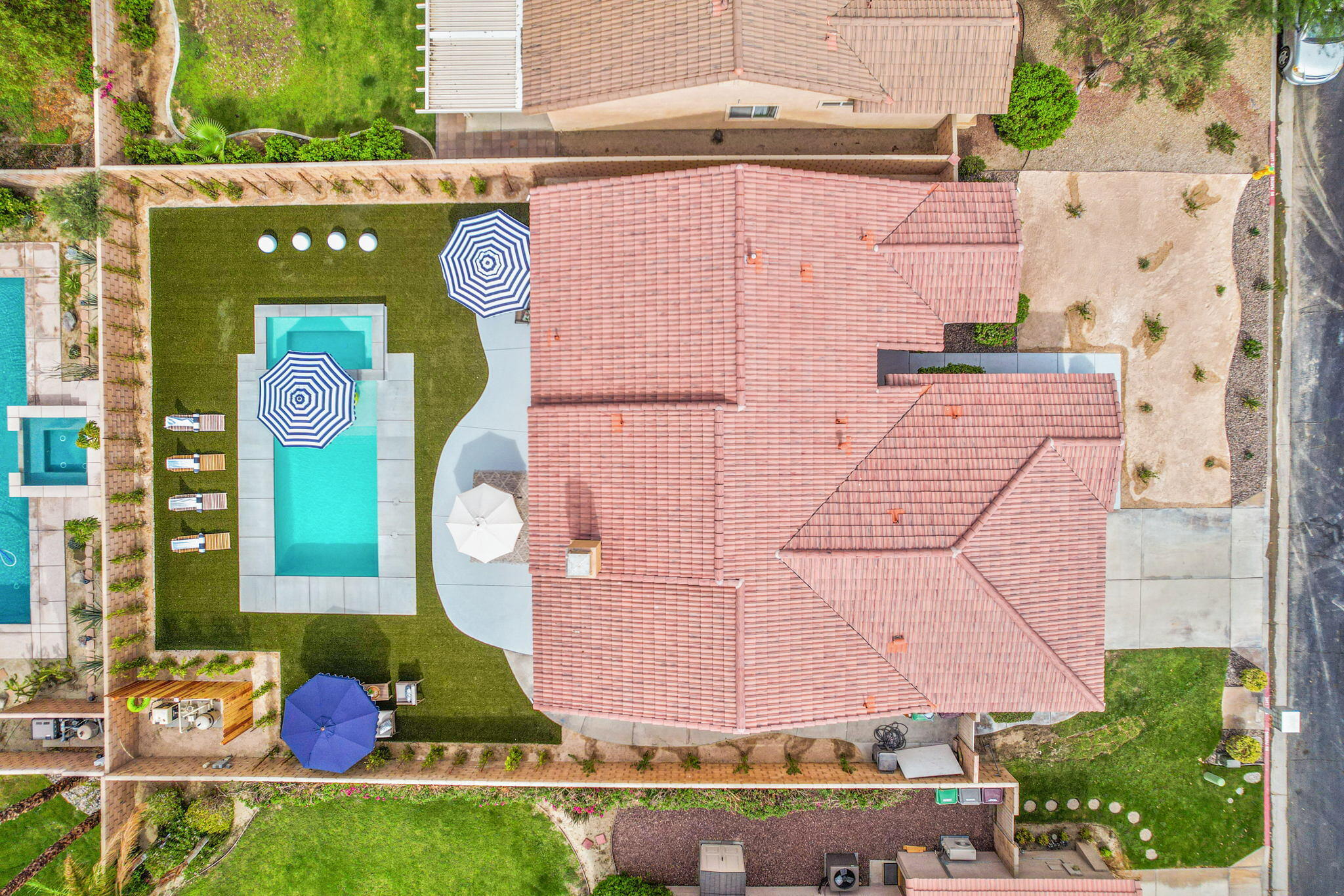 79340 Paseo Del Rey La Quinta, CA 92253 - Photo 16 of 69 an aerial view of a house with garden space and street view