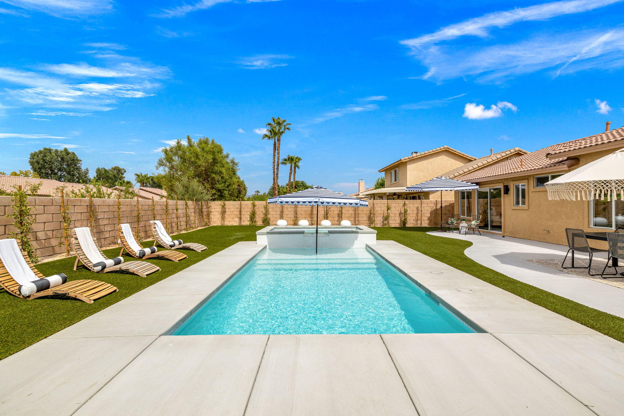 79340 Paseo Del Rey La Quinta, CA 92253 - Photo 4 of 69 a view of a house with swimming pool