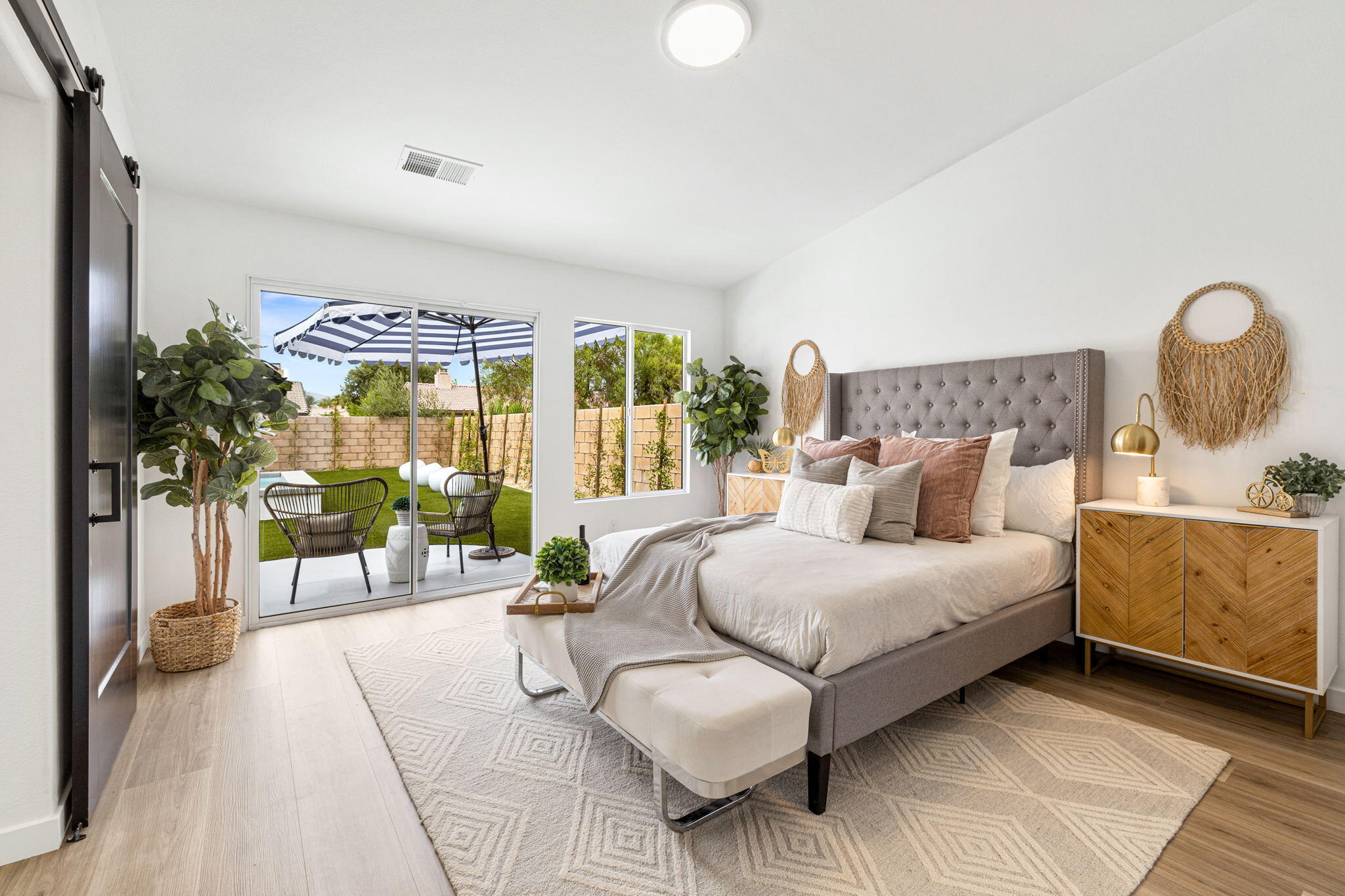79340 Paseo Del Rey La Quinta, CA 92253 - Photo 48 of 69 a bedroom with a bed and a large window