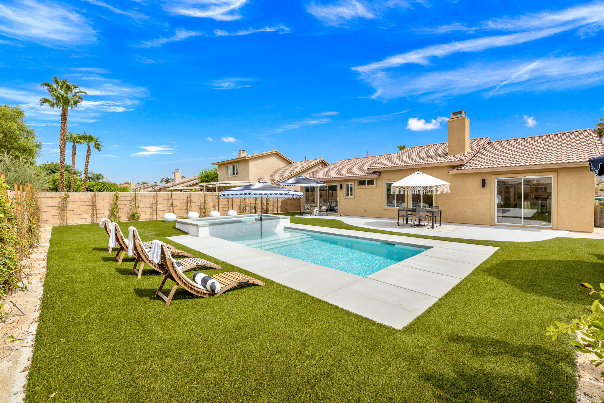 79340 Paseo Del Rey La Quinta, CA 92253 - Photo 5 of 69 a view of a house with a swimming pool