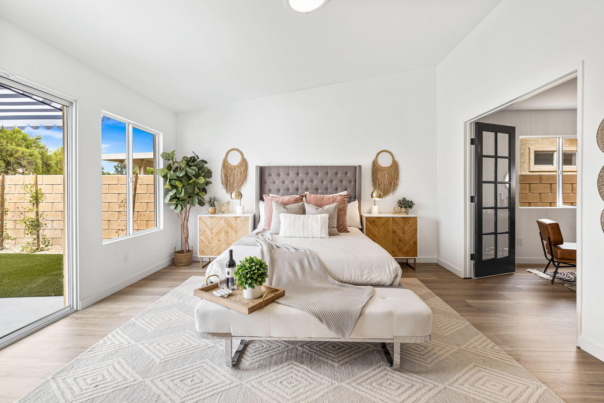 79340 Paseo Del Rey La Quinta, CA 92253 - Photo 51 of 69 a large white bed sitting in a living room next to a window