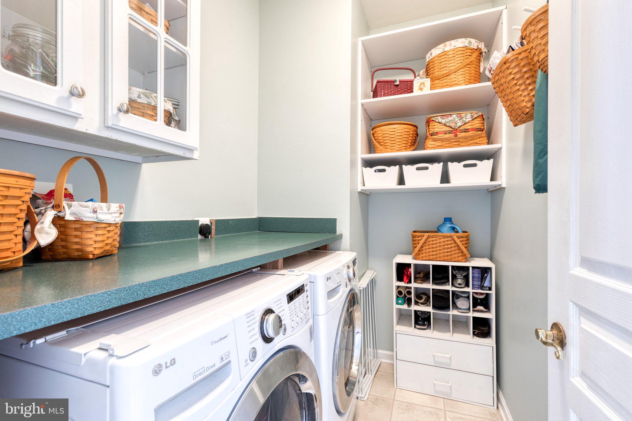 9741 Starling Road Ellicott City, MD 21042 - Photo 24 of 64 Charming laundry nook with smart storage.