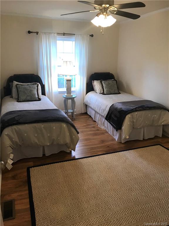 5941 Quail Hollow Road Charlotte, NC 28210 - Photo 13 of 20 a bedroom with a bed and window