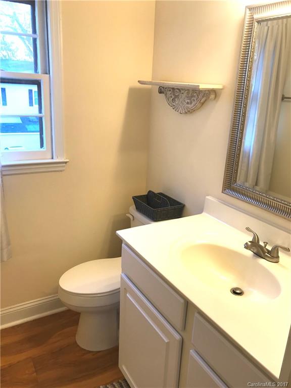5941 Quail Hollow Road Charlotte, NC 28210 - Photo 16 of 20 a bathroom with a sink and a toilet