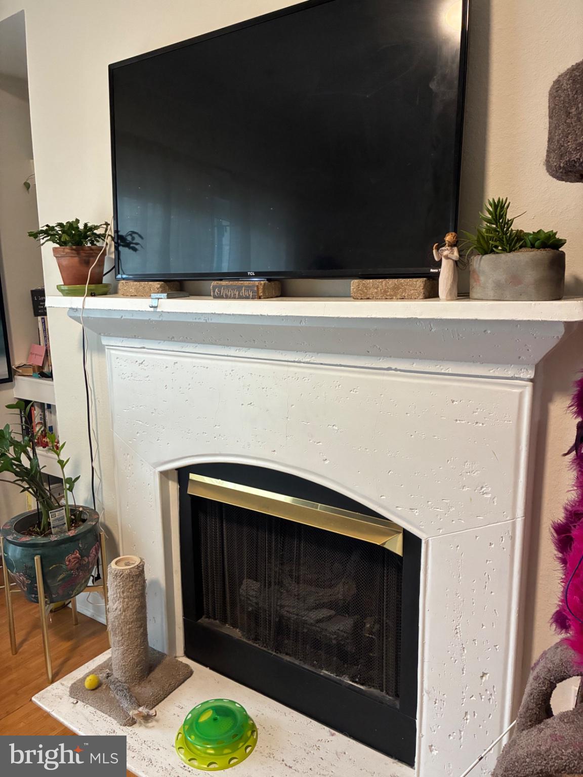 1571 Spring Gate Dr., Unit 6206 McLean, VA 22102 - Photo 17 of 26 Modern fireplace with sleek design.