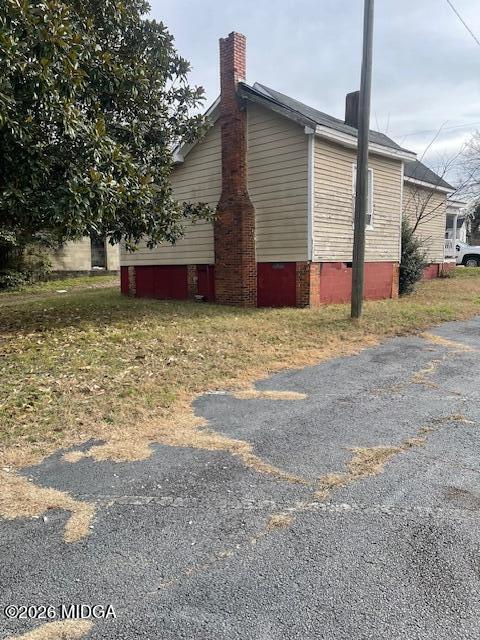 1837 2nd Avenue Macon, GA 31201 - Photo 4 of 4 a view of a house with a yard and garage