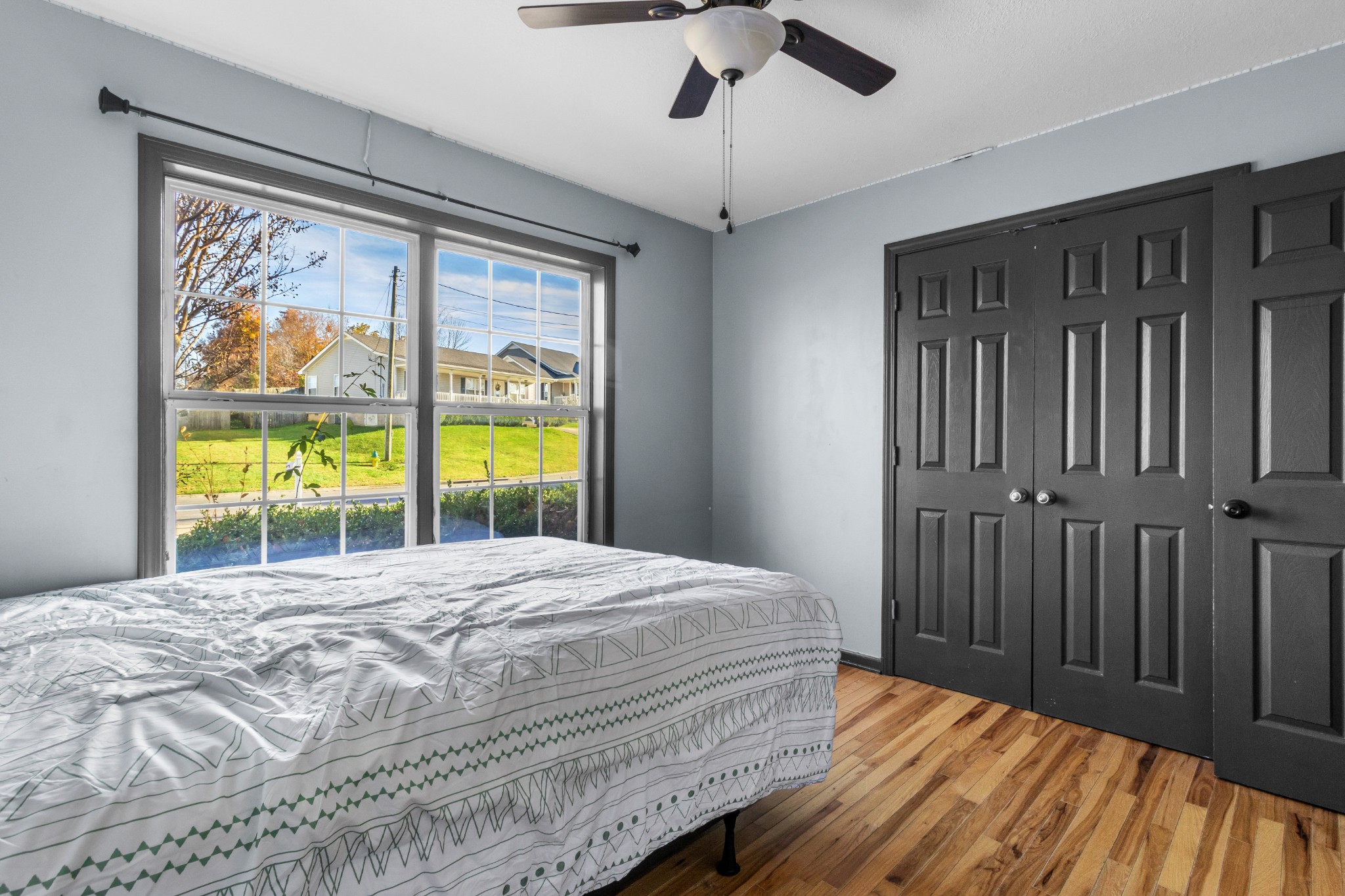2883 Rome Lane Clarksville, TN 37040 - Photo 12 of 23 a bedroom with a large bed and a window