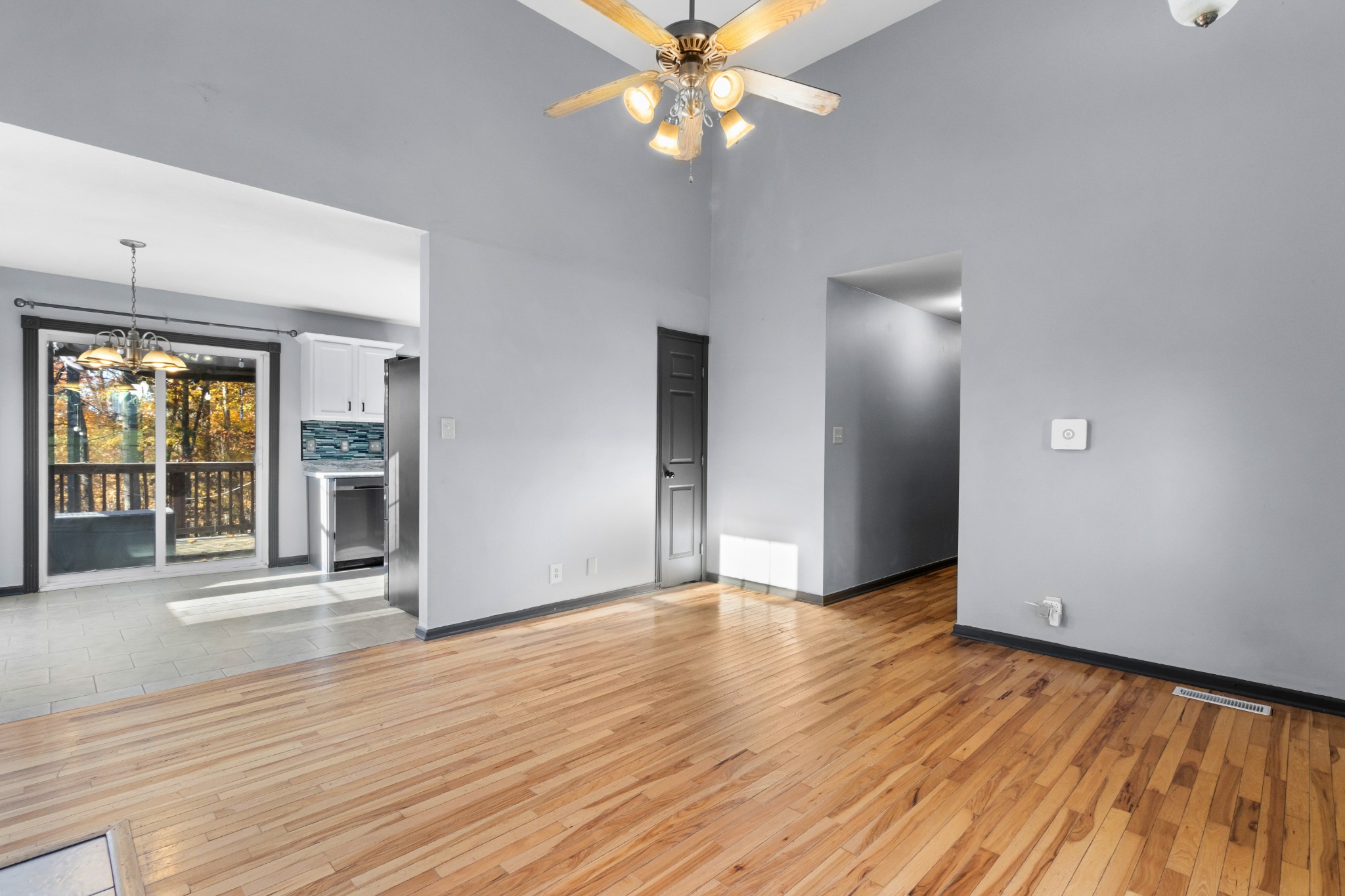 2883 Rome Lane Clarksville, TN 37040 - Photo 4 of 23 wooden floor in an empty room with a window