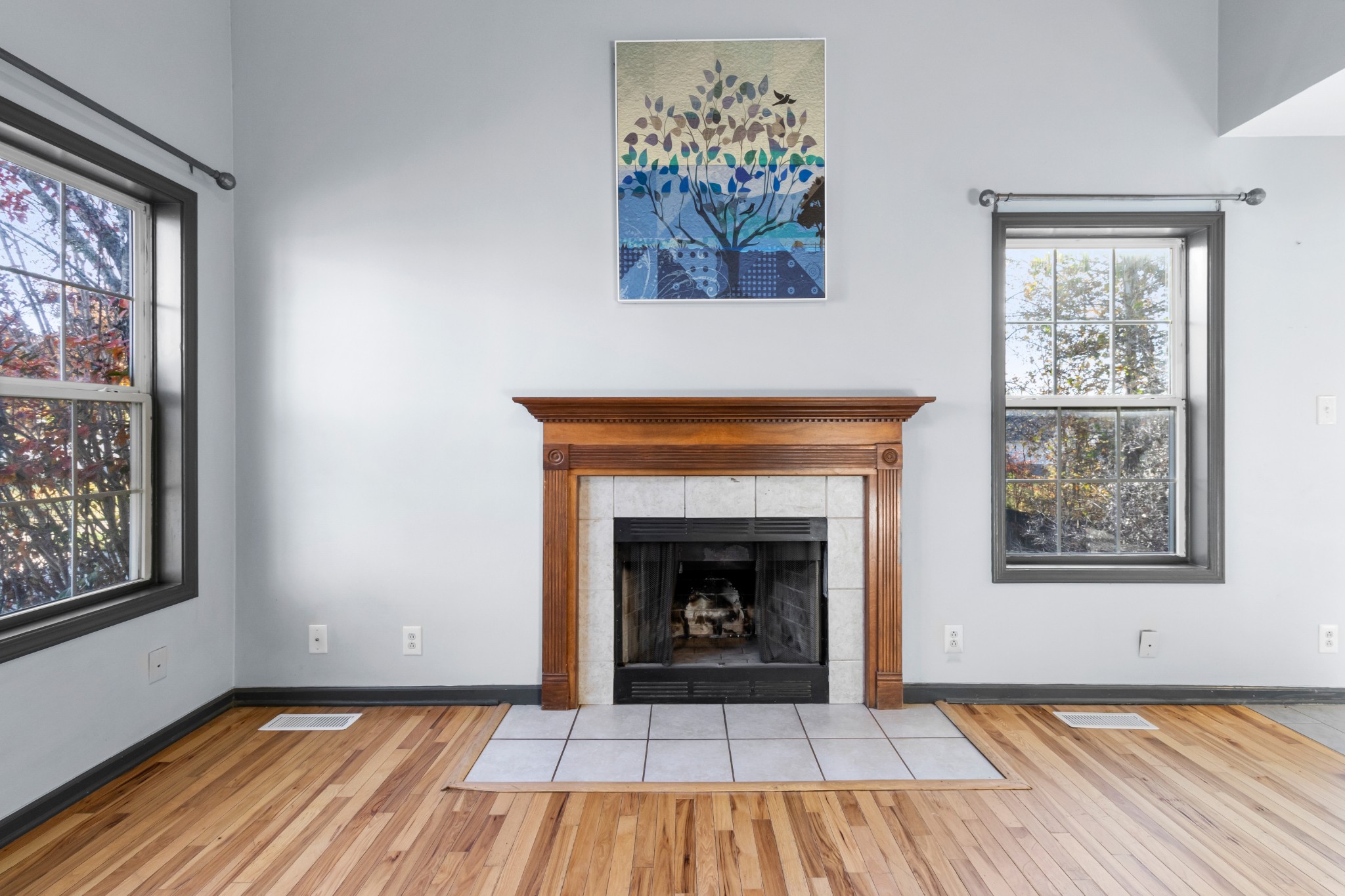 2883 Rome Lane Clarksville, TN 37040 - Photo 5 of 23 a view of an empty room with wooden floor and a window