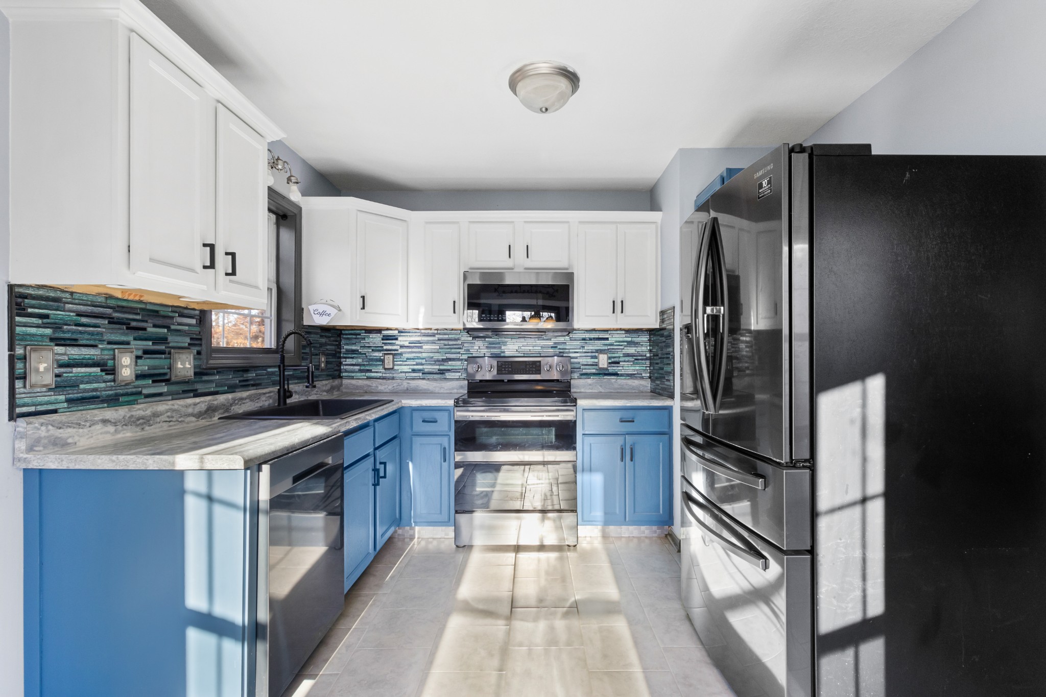2883 Rome Lane Clarksville, TN 37040 - Photo 6 of 23 a kitchen with stainless steel appliances granite countertop a refrigerator stove and sink
