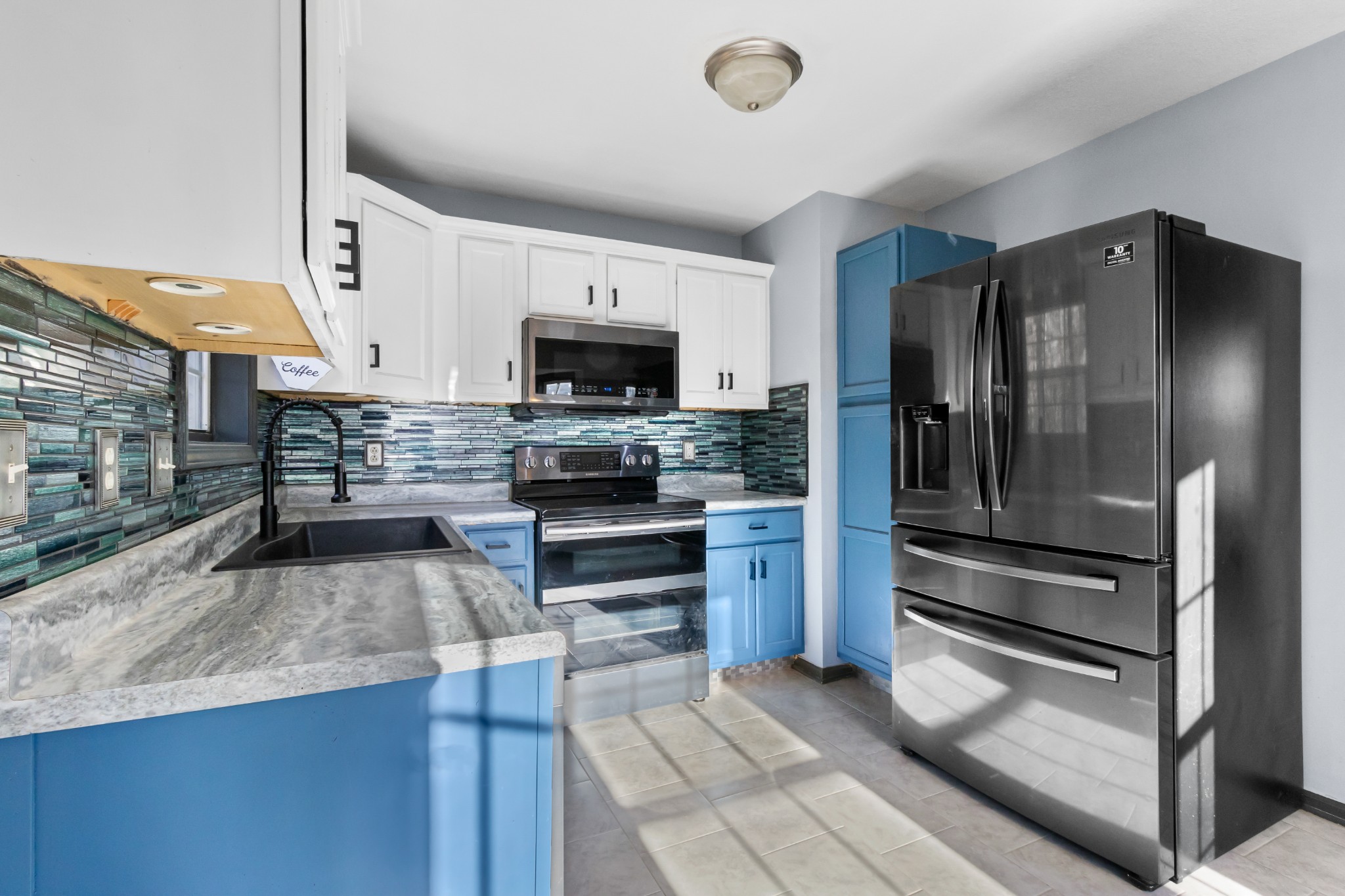 2883 Rome Lane Clarksville, TN 37040 - Photo 7 of 23 a kitchen with a refrigerator and a sink