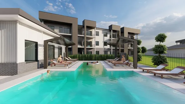 a view of a patio with table and chairs and potted plants