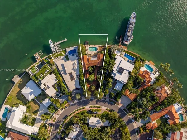 an aerial view of a house with outdoor space sitting space