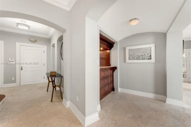 an empty room and chair in a room