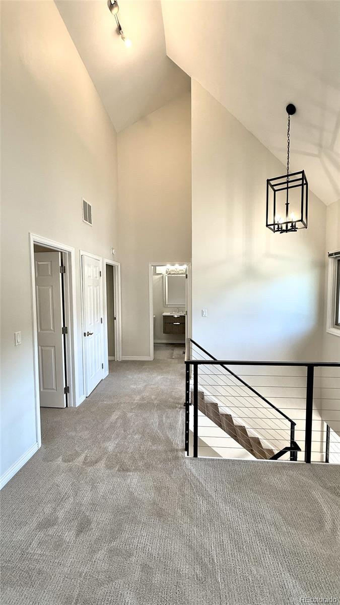 15789 Sandtrap Way Morrison, CO 80465 - Photo 13 of 34 a view of a room with gym equipment