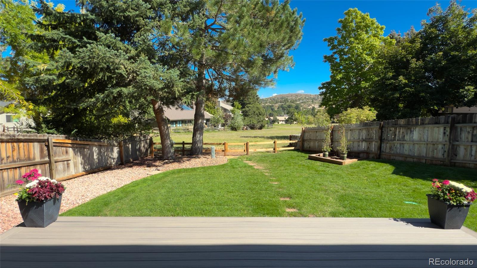 15789 Sandtrap Way Morrison, CO 80465 - Photo 40 of 42 a view of a garden