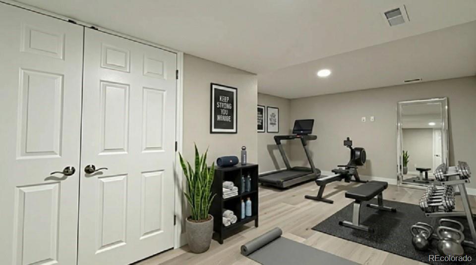 15789 Sandtrap Way Morrison, CO 80465 - Photo 8 of 42 a view of a room with gym equipment