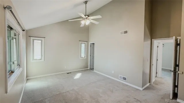 an empty room with fan