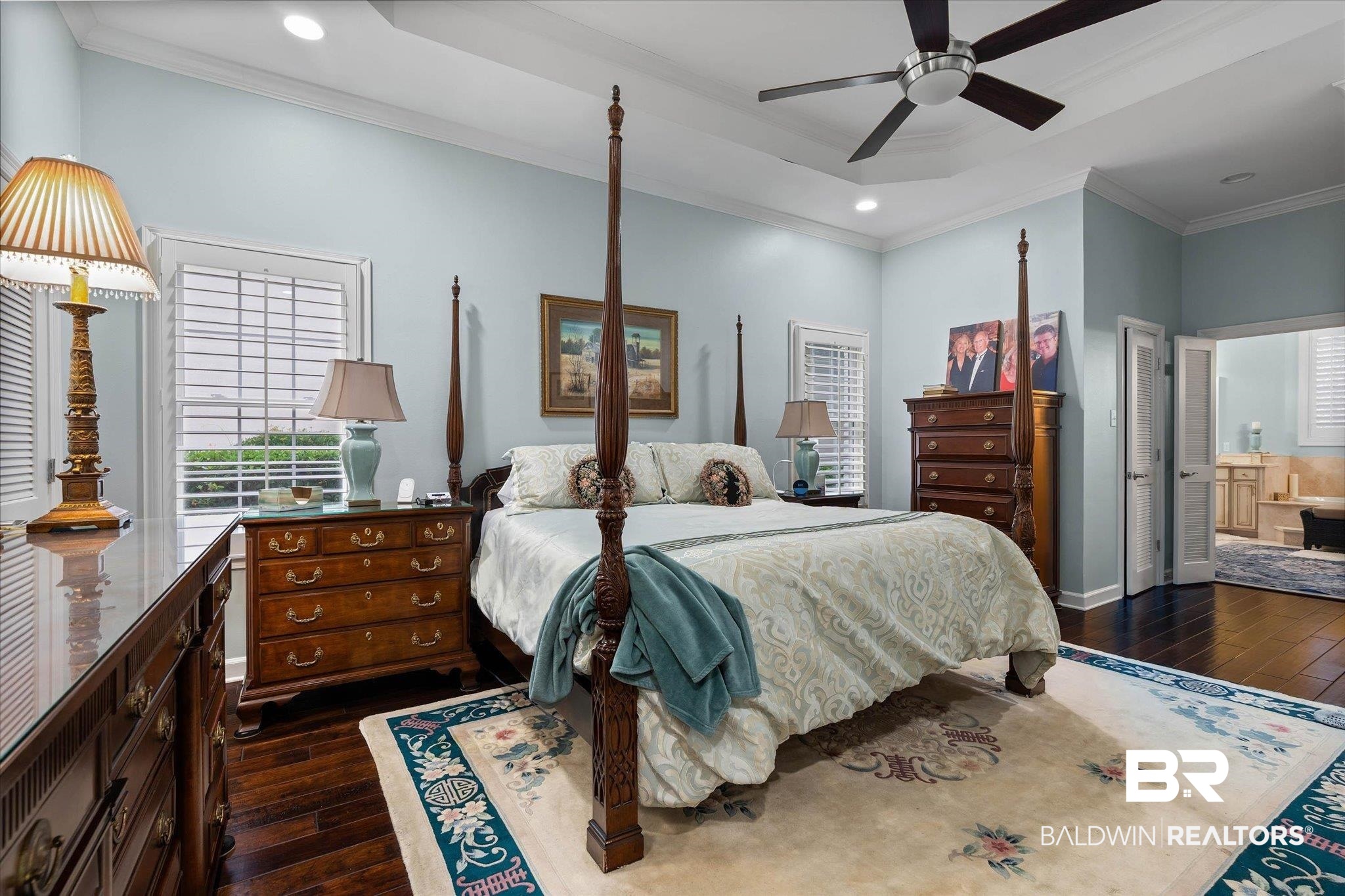 136 Old Mill Road Fairhope, AL 36532 - Photo 15 of 36 Recessed lighting illuminates the room, featuring crown molding and a tray ceiling with a ceiling fan